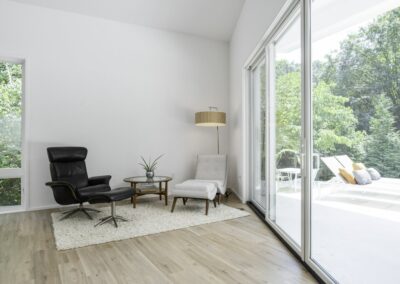 Real estate photography of glass doors and sitting area